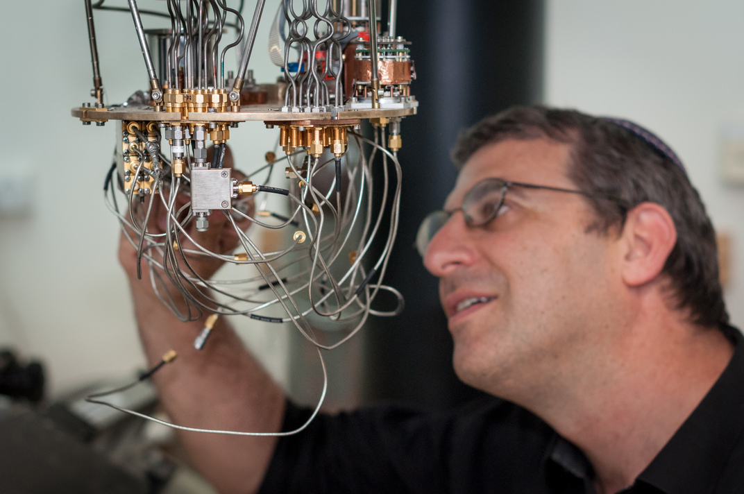 Prof Nadav Katz with a low temperature setup for testing superconducting detectors at the Hebrew Universitys Quantum Information Science Center . (Credit: Yitz Woolf for Hebrew University) 